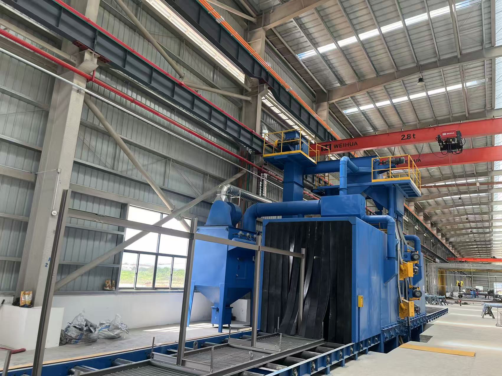 Automatic sandblasting machine